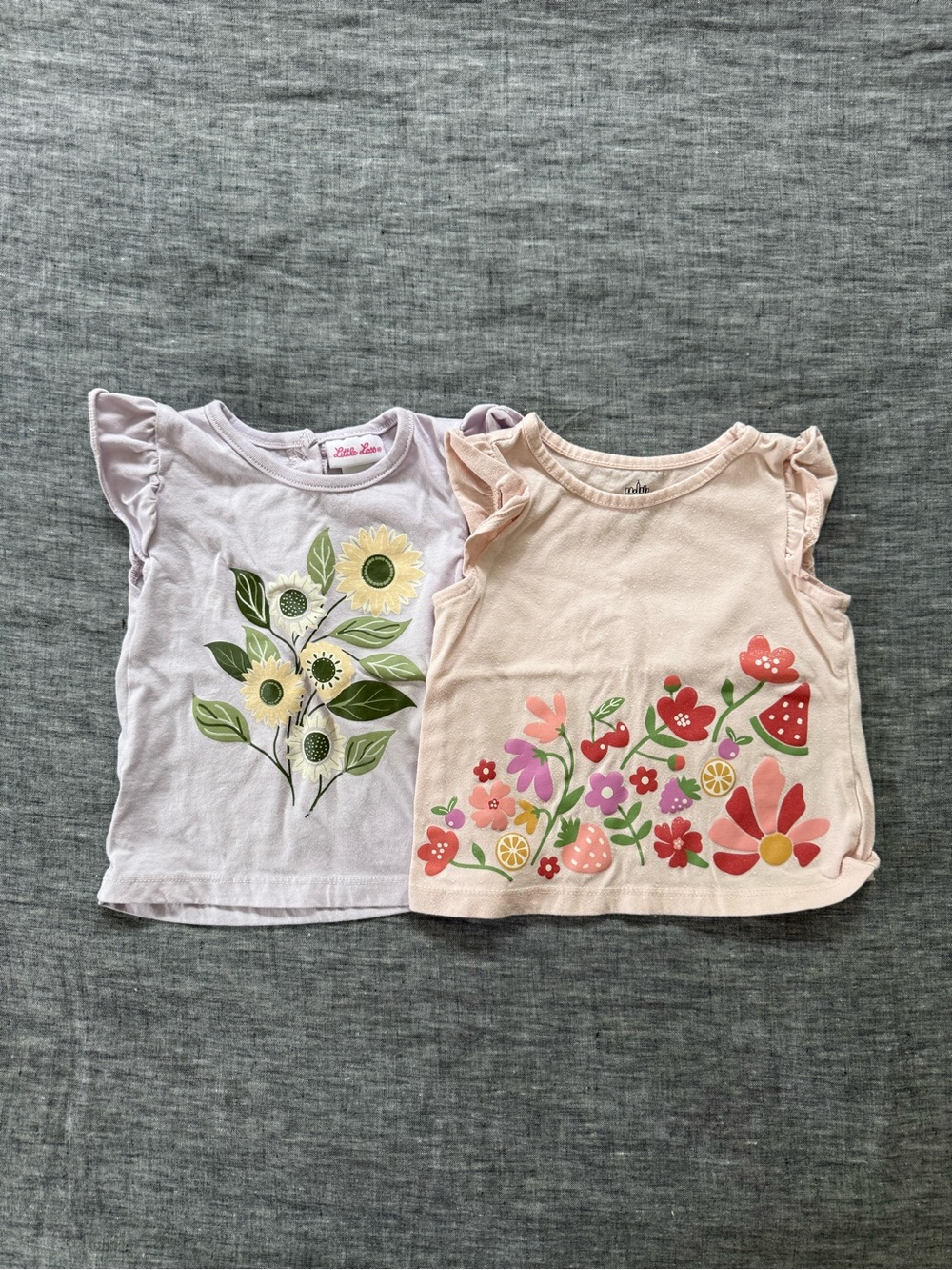 Set of 2 floral/shimmer short sleeve tops